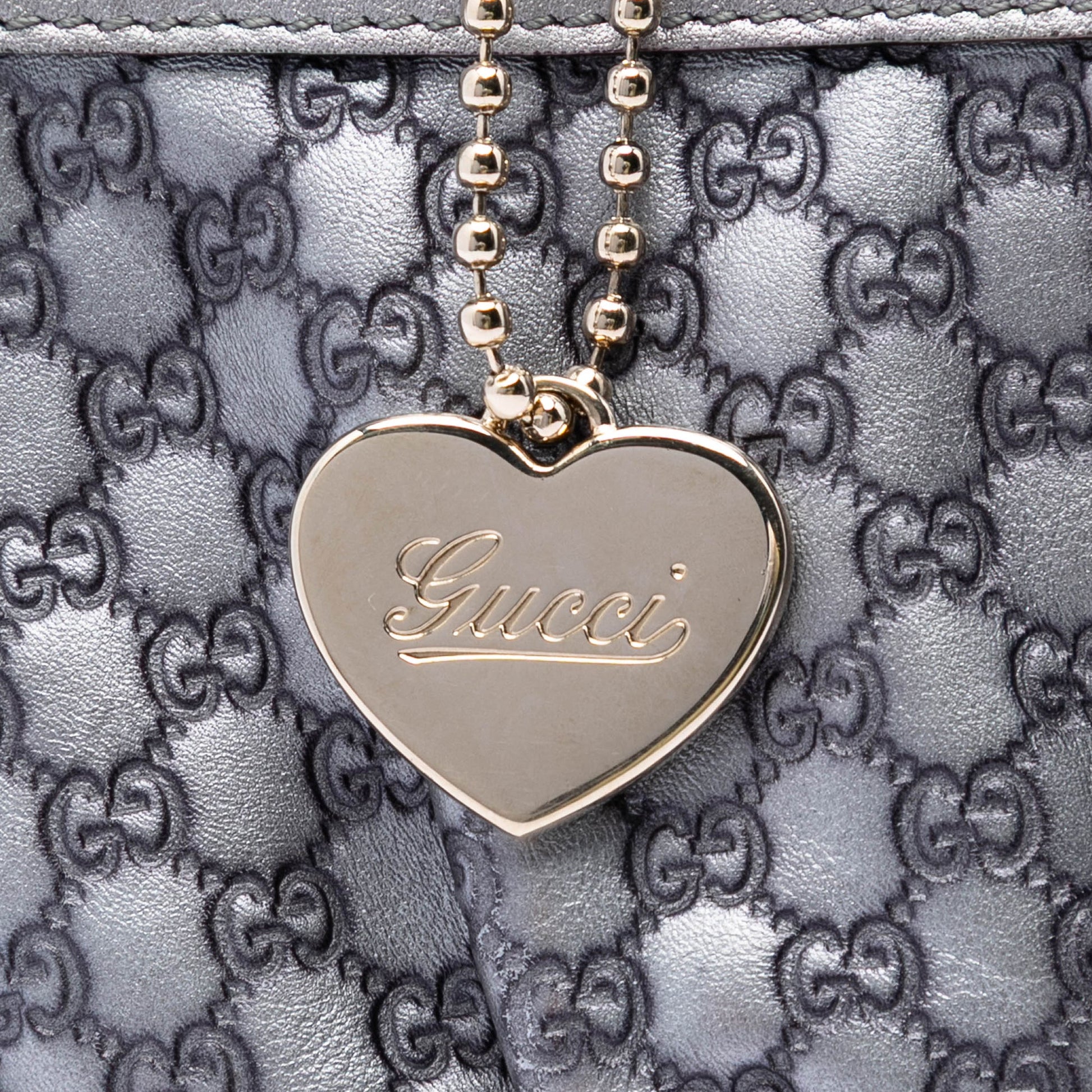 Gucci Microguccissima Heart Wristlet Pochette