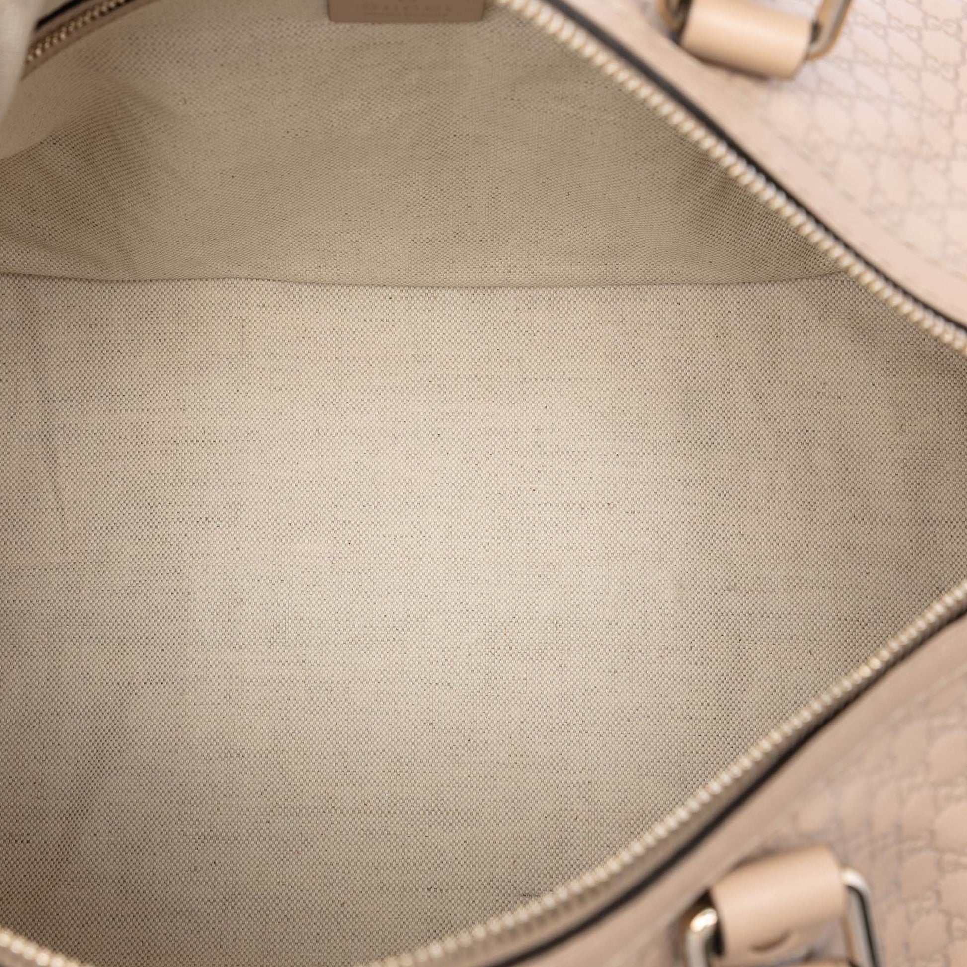 Gucci Medium Microguccissima Joy Boston Bag