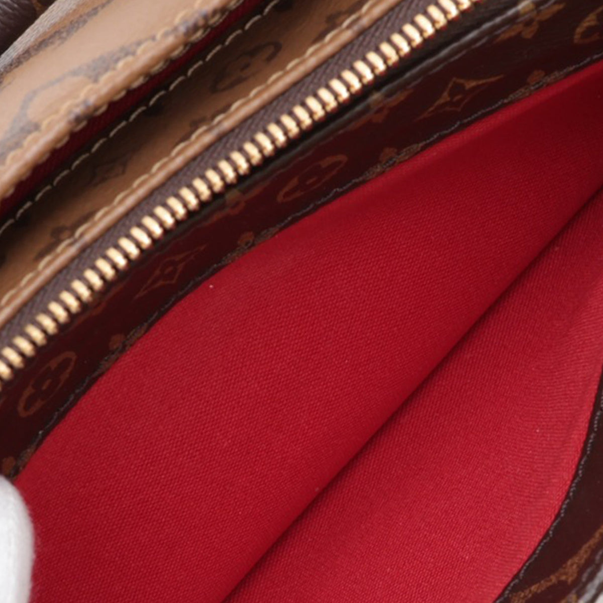 Louis Vuitton Monogram Reverse OnTheGo East West — Brown