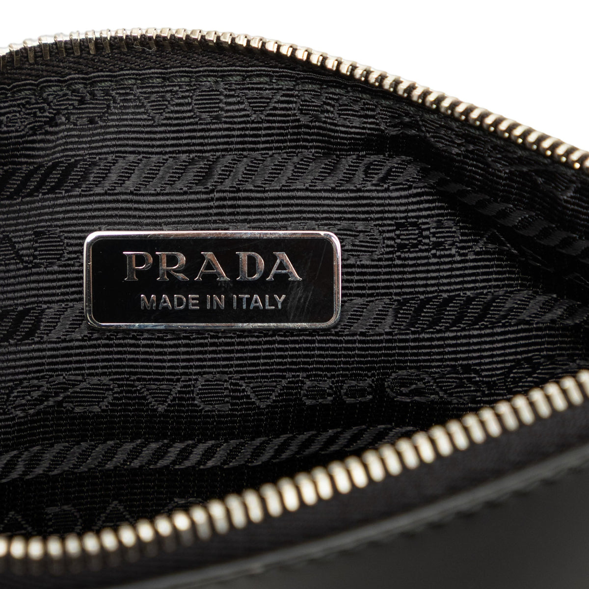 Prada Spazzolato Leather Clutch — Black