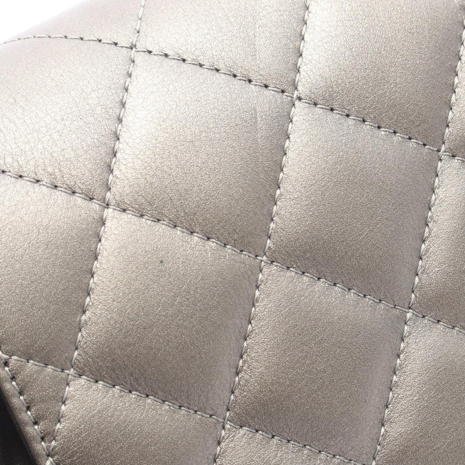 Chanel Metallic Quilted Lambskin Saddle Flap