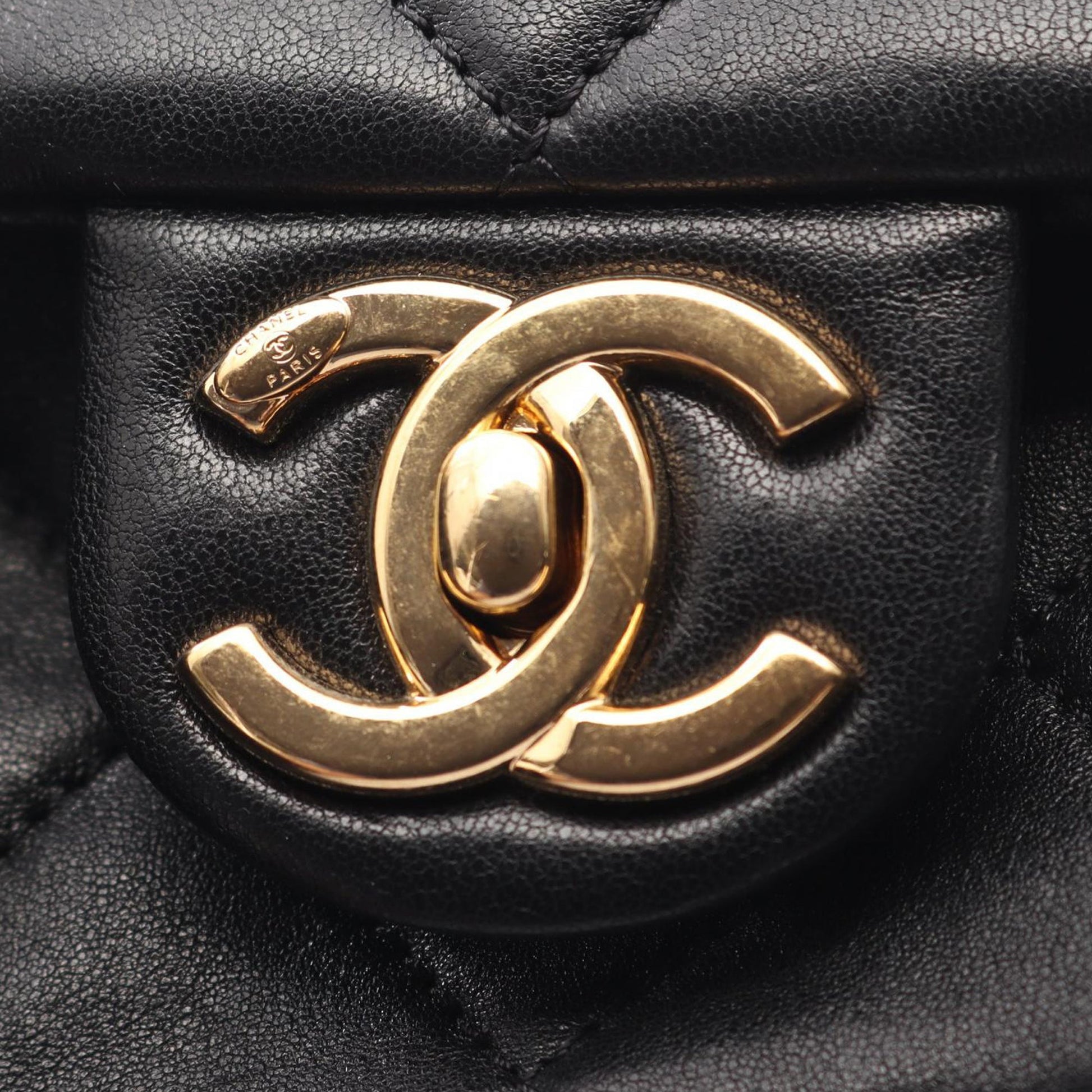 Chanel Mini Quilted Lambskin Oval Logo Chain Top Handle Flap