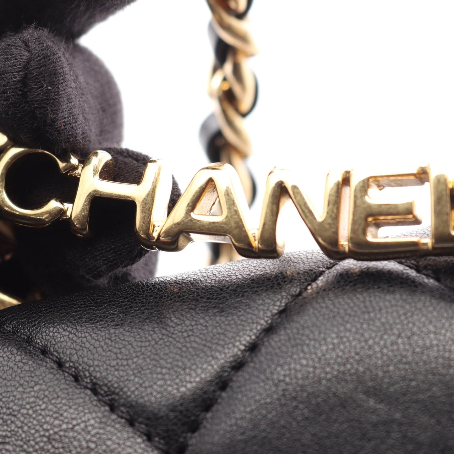 Chanel Mini Quilted Lambskin Oval Logo Chain Top Handle Flap