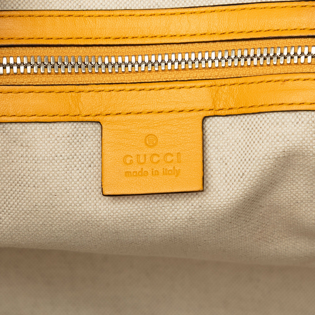 Gucci GG Embossed Calfskin Duffle Bag — Yellow