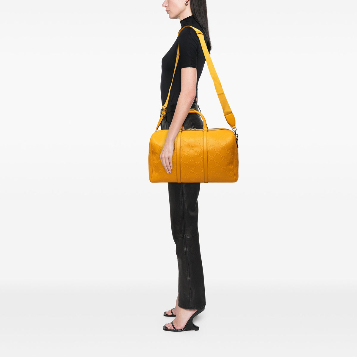 Gucci GG Embossed Calfskin Duffle Bag — Yellow