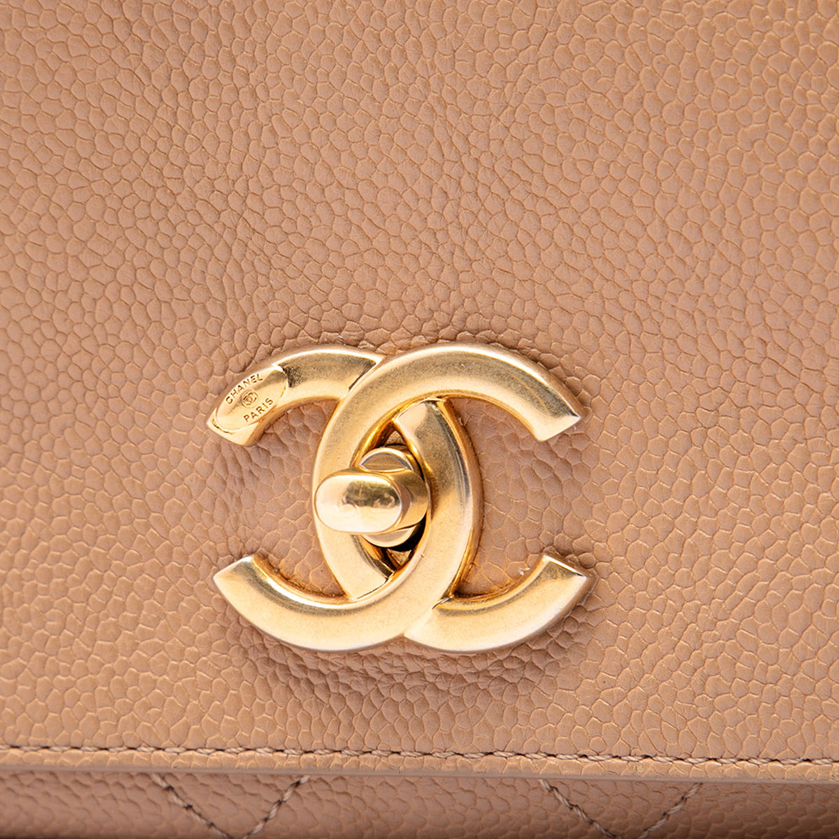 Chanel CC Stitched Caviar Turnlock Top Handle Flap — Beige
