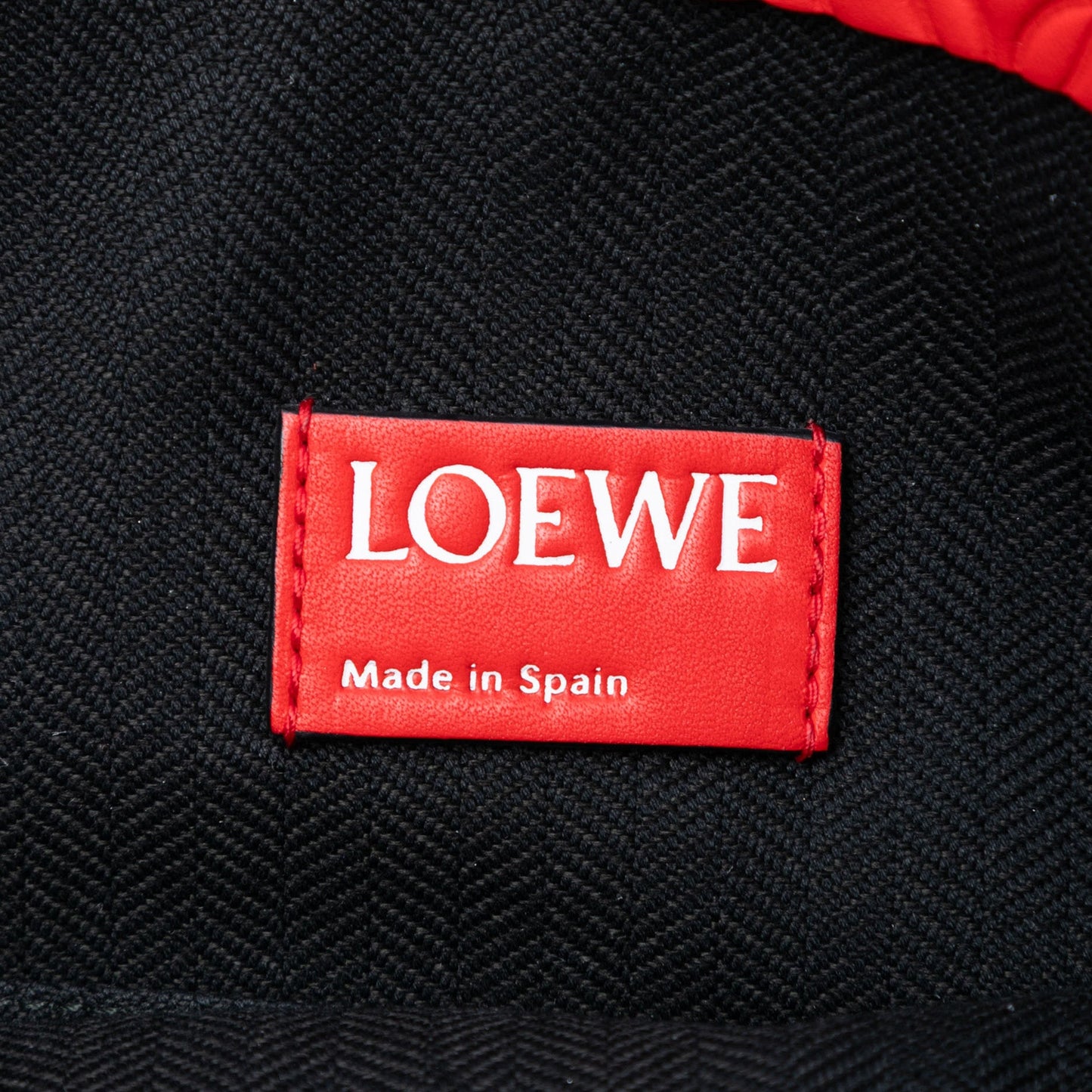 LOEWE Embossed Anagram Leather Repeat T Clutch