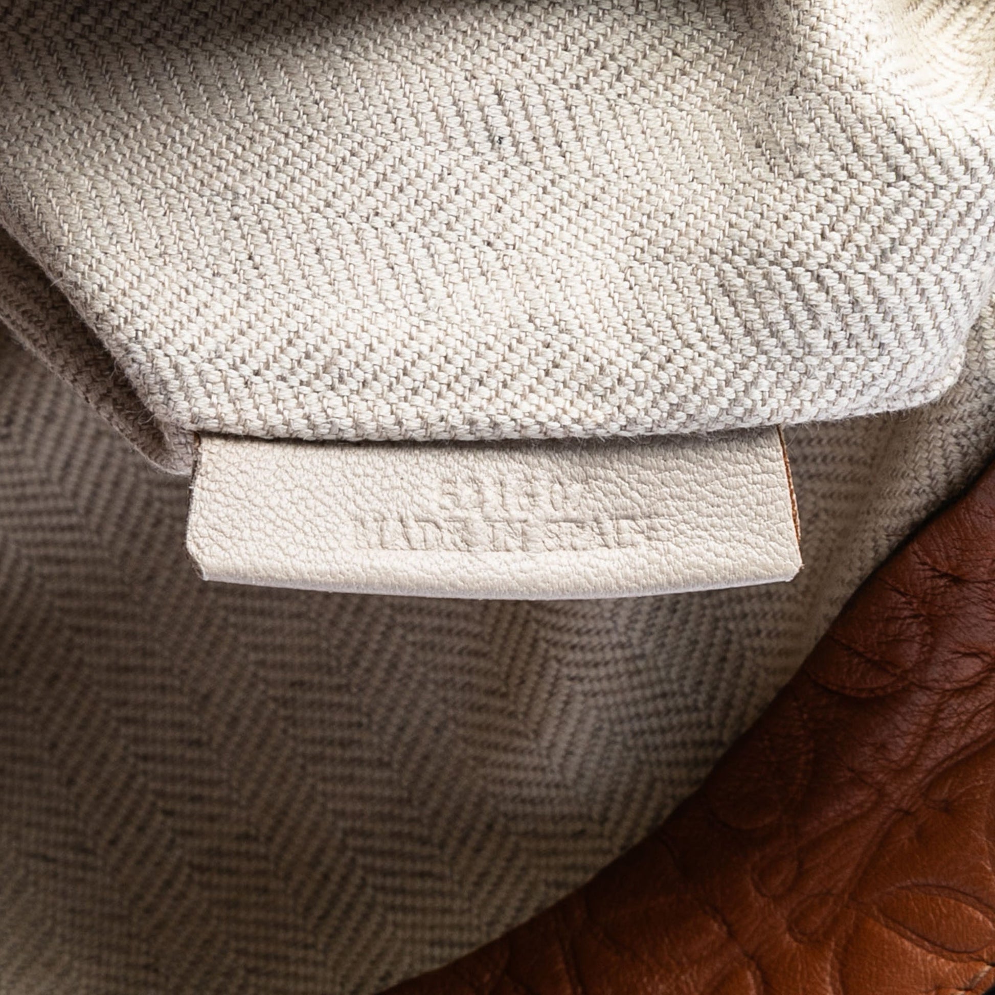 Embossed Anagram Leather Repeat T Clutch