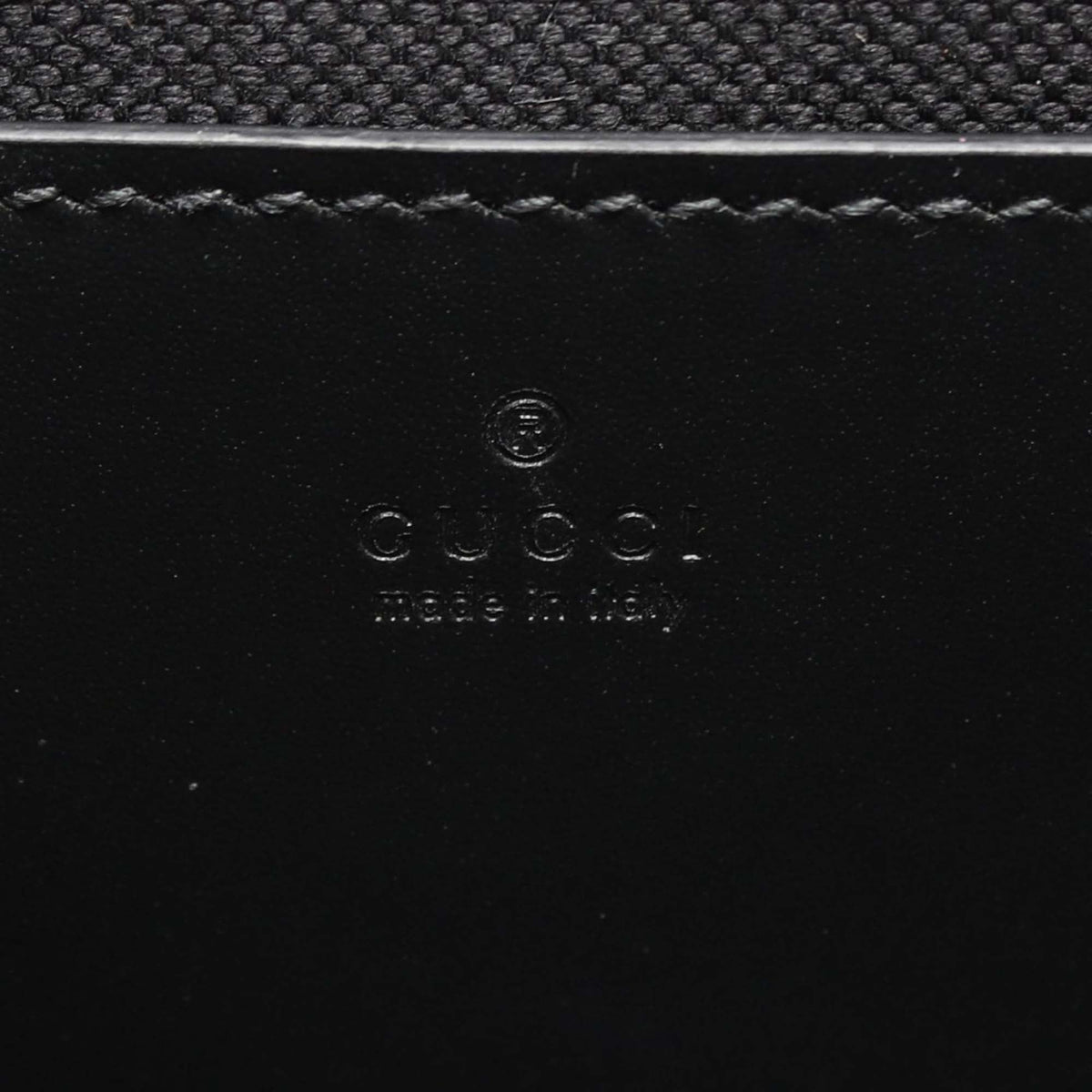Gucci Super Mini GG Jumbo Embossed Leather Pochette